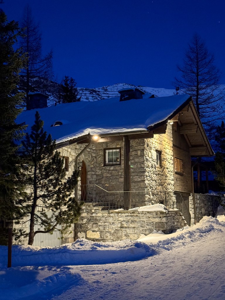 Snowy hut in the dark