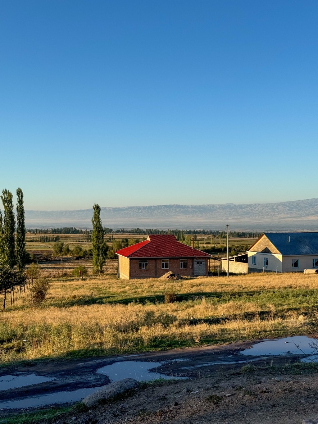 Beautiful landscape with small houses in Kyrgyztan.