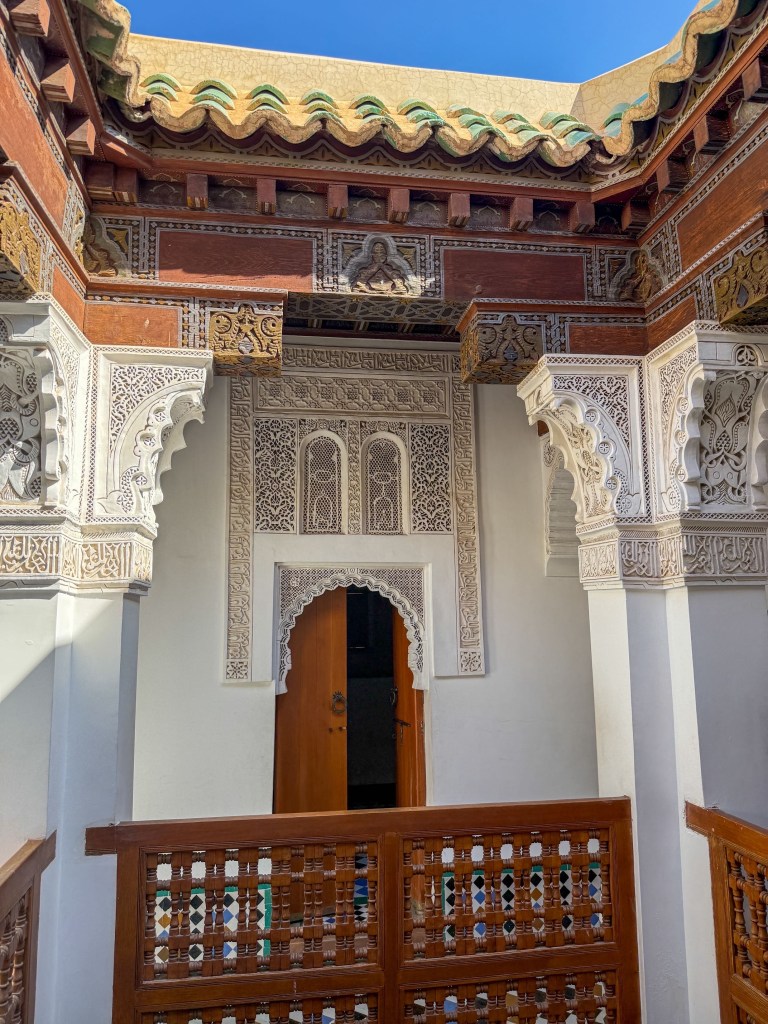 Beautifully decorated doorway at the Ben Youssef Mosque in Marrakech.